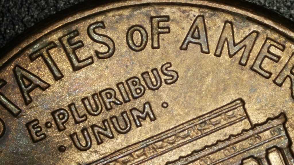 Close-up of the reverse of a 2000 Lincoln cent showing the Wide AM variety. The A in STATES is perfectly centered between the T and E, and the spacing between the A and M in AMERICA is wide.