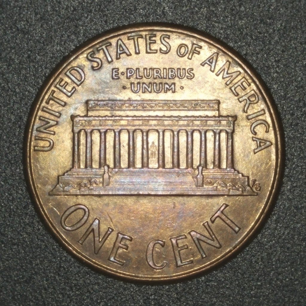 Reverse of a 2000 Lincoln cent showing the Wide AM variety. The A in STATES sits centered, and the strong FG initials are clear on the right side of the memorial.