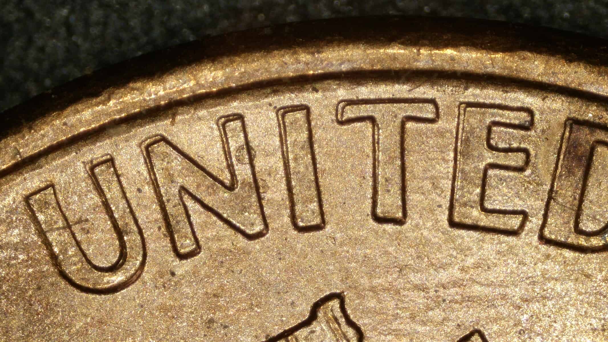 1995 Lincoln cent showing machine doubling on UNITED STATES lettering