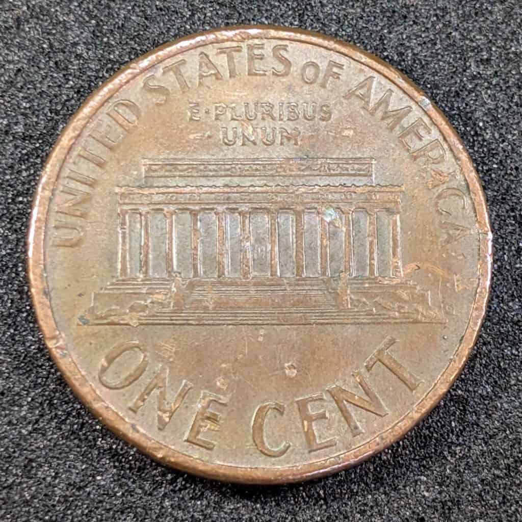 Full reverse view of a 1996 Lincoln cent with weak design elements caused by a grease-filled die error.