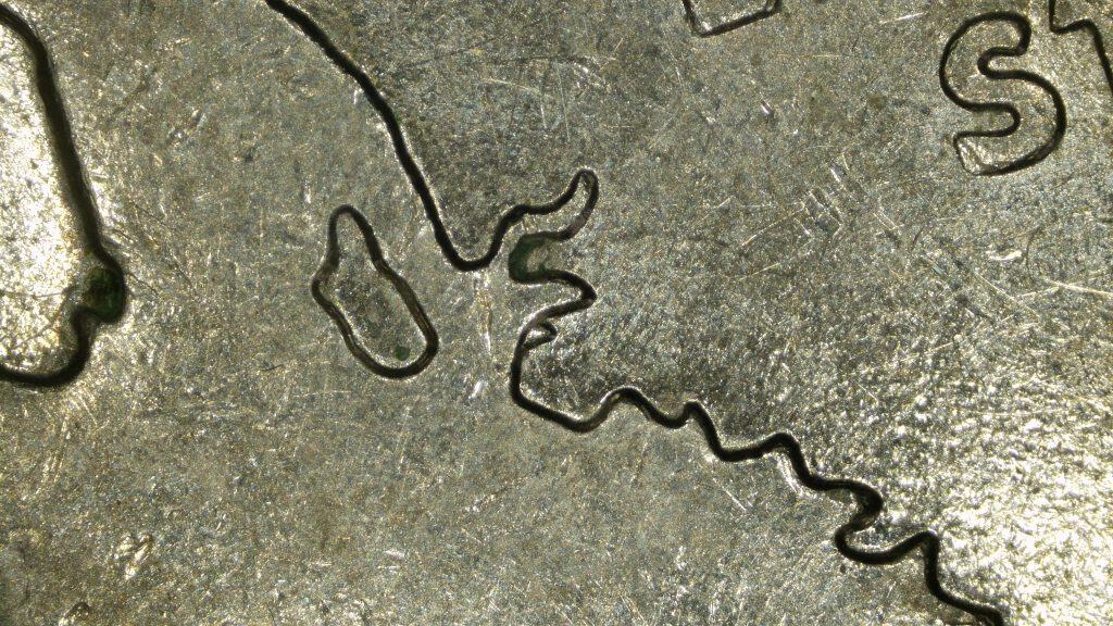 Die crack marker confirming 2007 Wyoming quarter FS-801 doubled die reverse