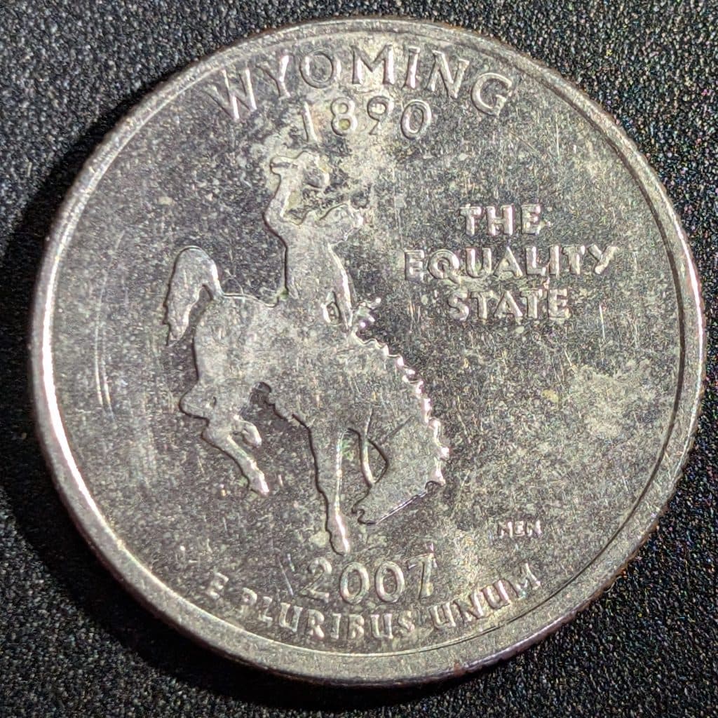 Full reverse of 2007 Wyoming state quarter showing the saddle design