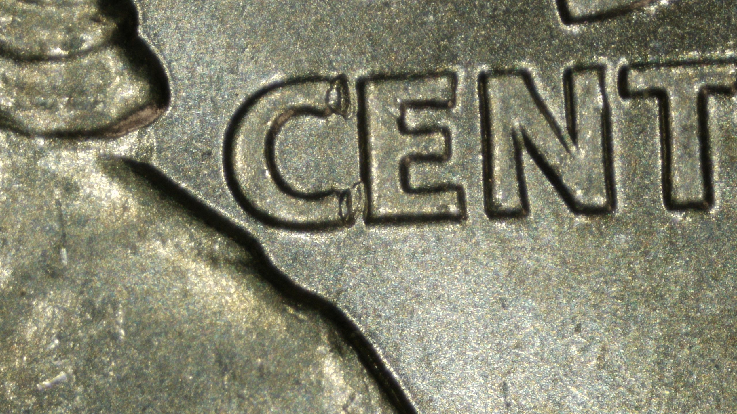 Die chips on C of CENTS. One of the die markers confirming the error