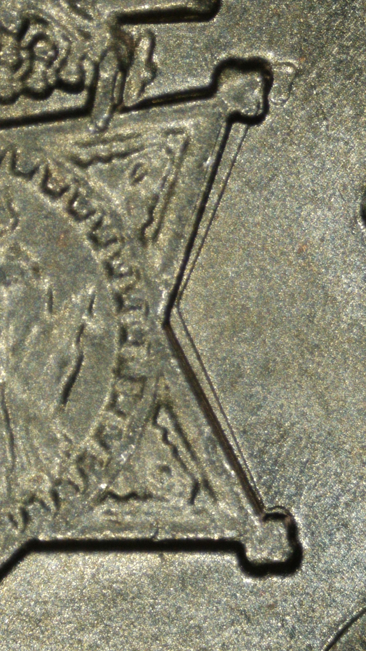 Close-up of the Medal of Honor on a 2024-P Dr. Mary Edwards Walker quarter showing strong rotational doubling along the right side of the medal.