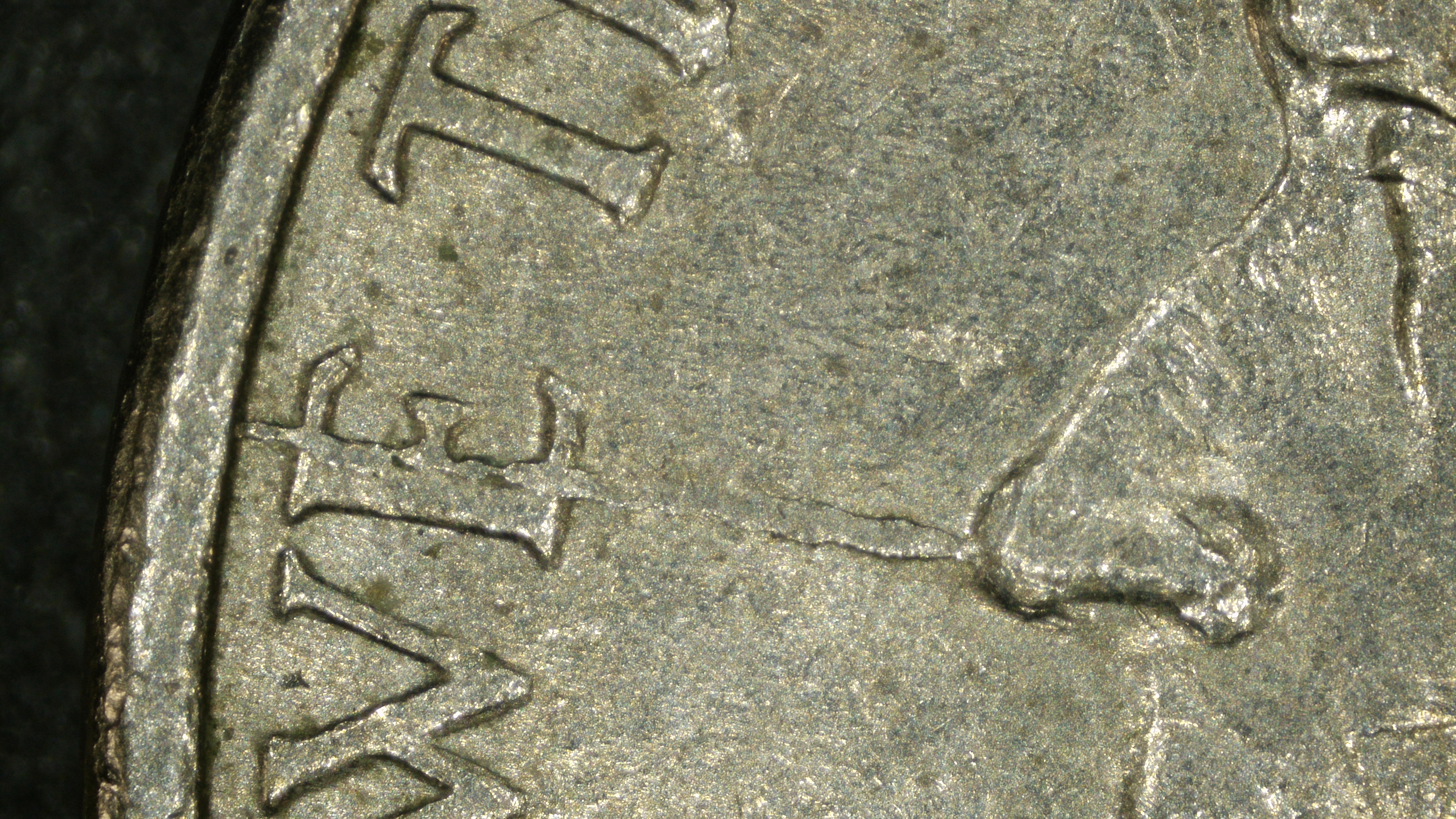 Spiked head die crack crossing WE on 1996-P Jefferson nickel