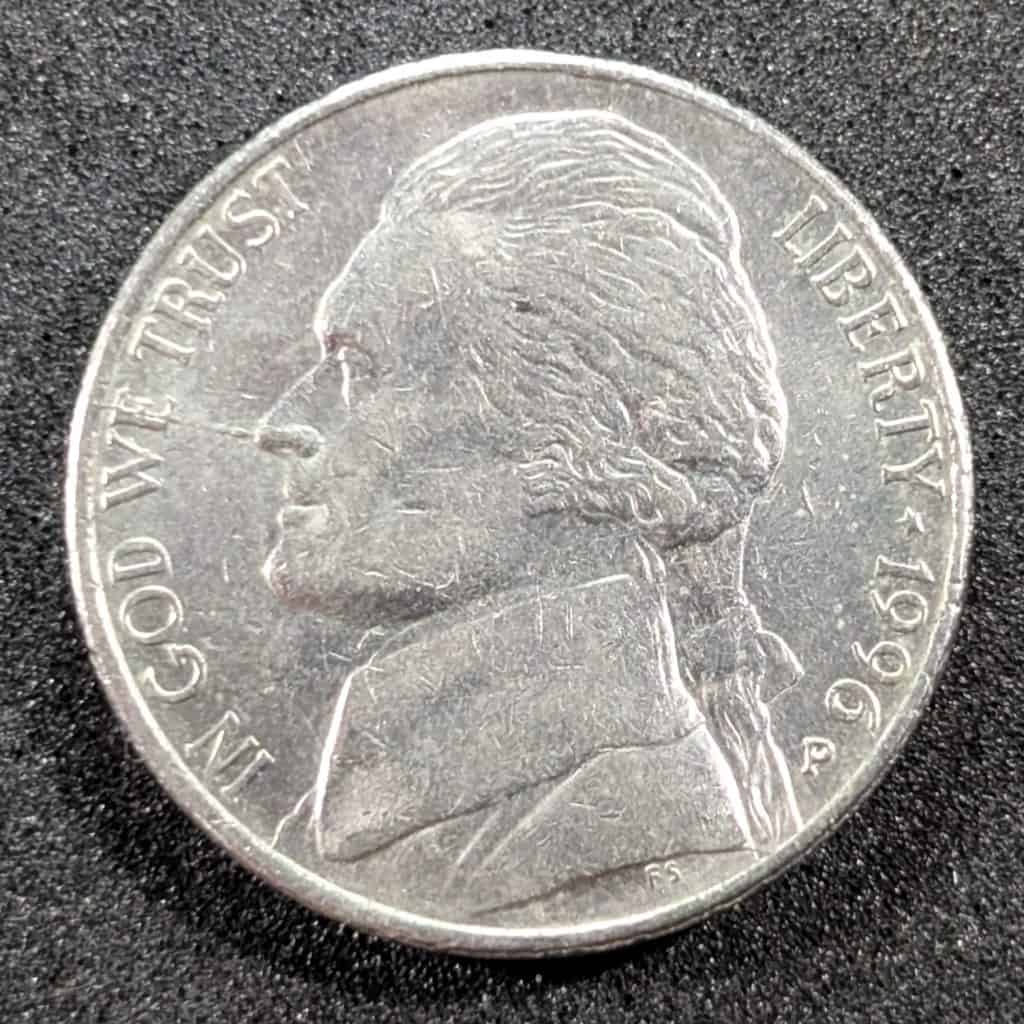 1996-P Jefferson nickel obverse showing spiked head die crack in context